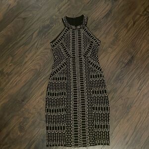 Perfect date night or GNO dress! BCBG MAXAZRIA Form fitting midi dress
